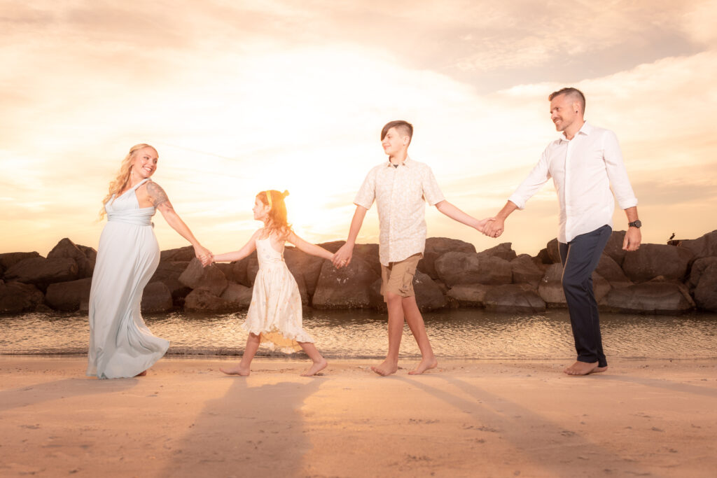 golden hour family photos on the beach in Tampa Bay