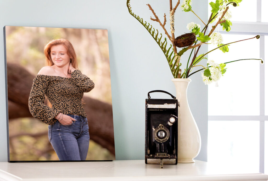how to store photos: small canvas print sitting on an end table
