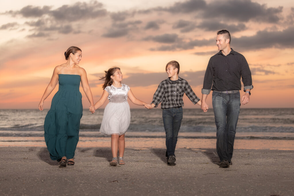 what to wear for family photos on the beach (pop of color, tulle skirts, dark jeans for the boys)