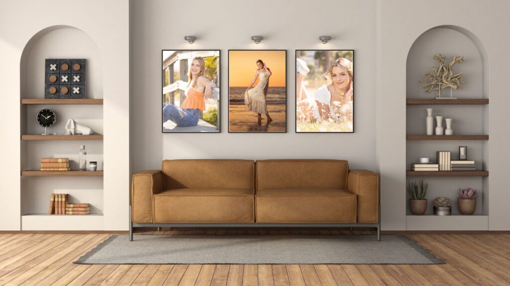senior girl photos hanging above living room couch for family wall gallery